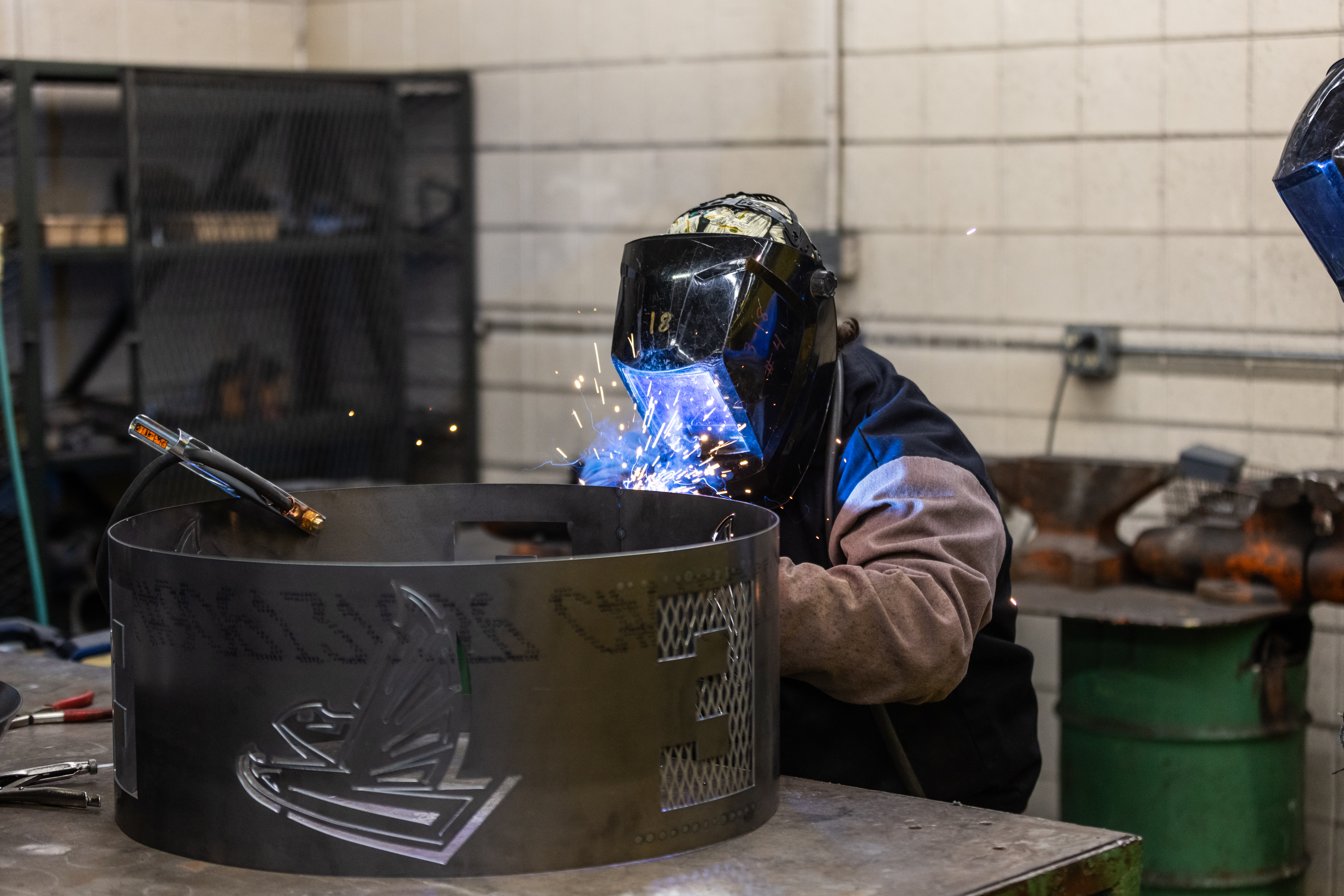 Student welding.